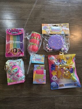 NIB Lot of 6 toys. 3 Taba squishies, 1 pink gumdrop, 1 butter strings, 1 snarkie